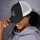 Lioness Resolute Trucker Cap: Crown of Strength and Style