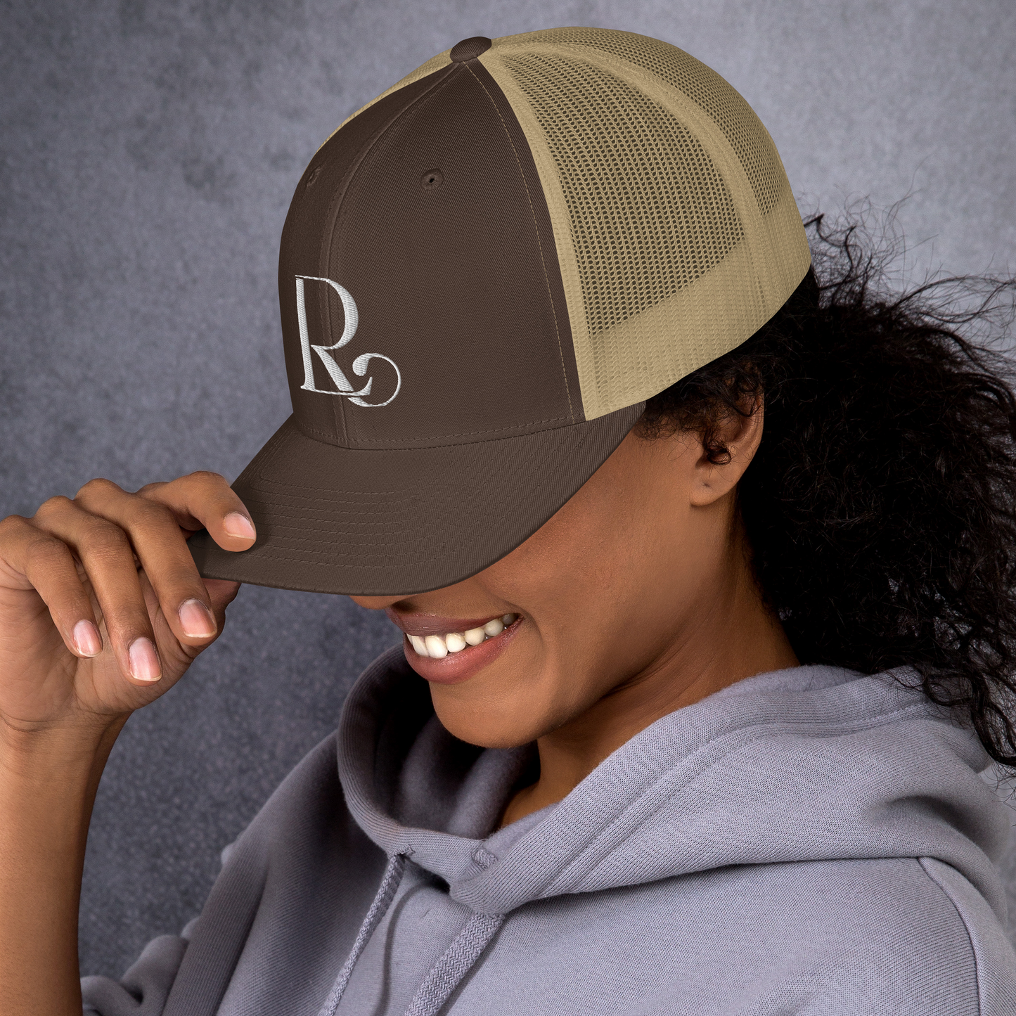 Lioness Resolute Trucker Cap: Crown of Strength and Style