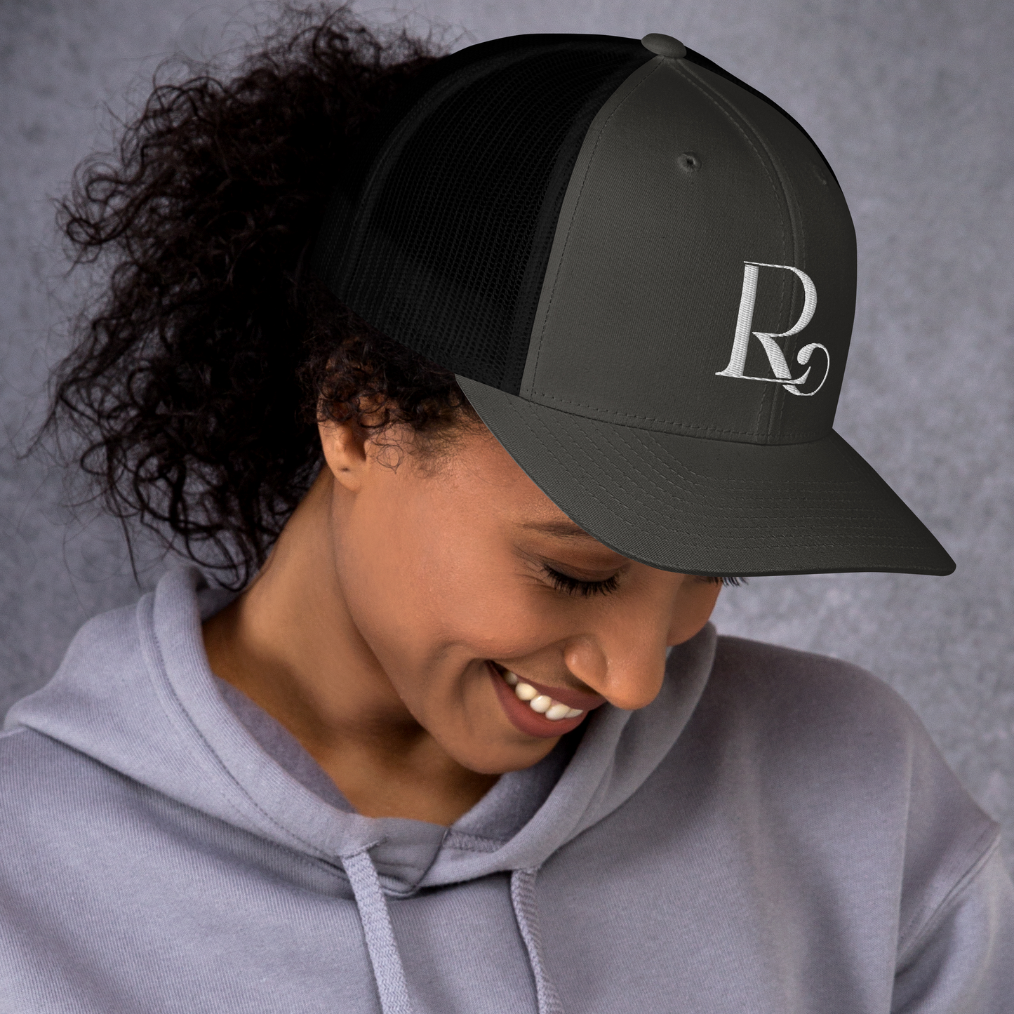 Lioness Resolute Trucker Cap: Crown of Strength and Style