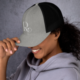 Lioness Resolute Trucker Cap: Crown of Strength and Style