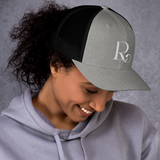 Lioness Resolute Trucker Cap: Crown of Strength and Style