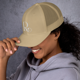 Lioness Resolute Trucker Cap: Crown of Strength and Style