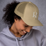 Lioness Resolute Trucker Cap: Crown of Strength and Style