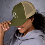 Lioness Resolute Trucker Cap: Crown of Strength and Style