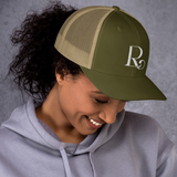 Lioness Resolute Trucker Cap: Crown of Strength and Style