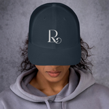 Lioness Resolute Trucker Cap: Crown of Strength and Style