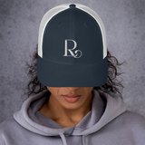 Lioness Resolute Trucker Cap: Crown of Strength and Style