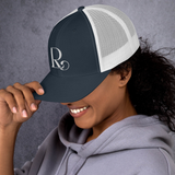 Lioness Resolute Trucker Cap: Crown of Strength and Style