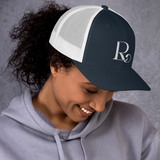 Lioness Resolute Trucker Cap: Crown of Strength and Style