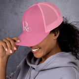 Lioness Resolute Trucker Cap: Crown of Strength and Style