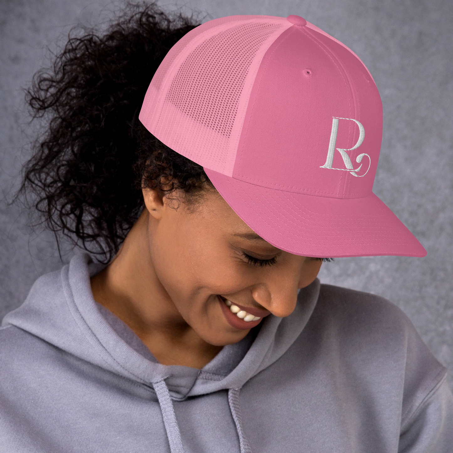 Lioness Resolute Trucker Cap: Crown of Strength and Style