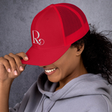 Lioness Resolute Trucker Cap: Crown of Strength and Style