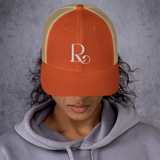 Lioness Resolute Trucker Cap: Crown of Strength and Style