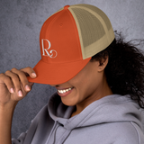 Lioness Resolute Trucker Cap: Crown of Strength and Style